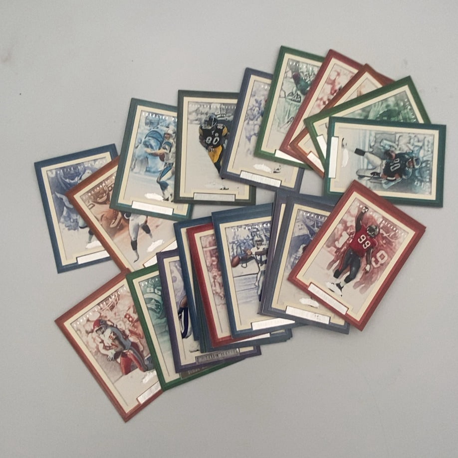 1995 Upper Deck Collector's Choice Special Edition Football: A collection of 1995 Upper Deck Collector's Choice Special Edition NFL football trading cards fanned out on a flat surface. The cards feature various players, including Jerry Rice and Warren Sapp, in 