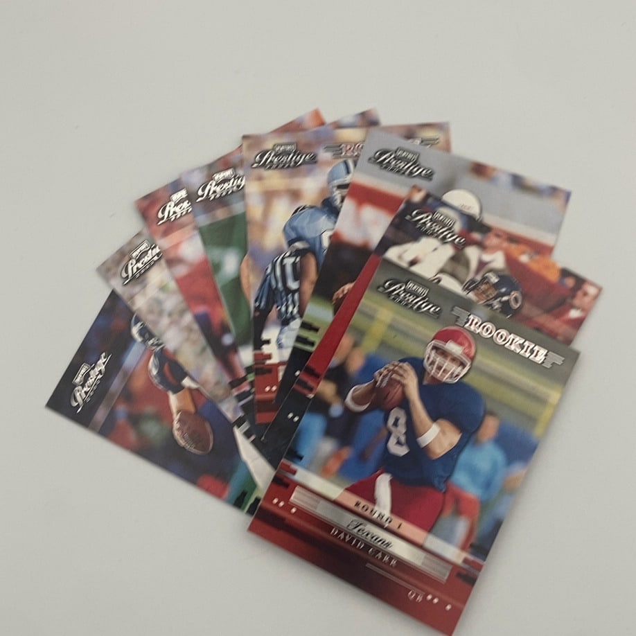 2002 Playoff Prestige Football Card Lot: Raw - ungraded - condition is as shown and sold as isThis is a collection of 2002 Playoff Prestige football cards fanned out. The front card prominently features David Carr of the Texans with a Rookie