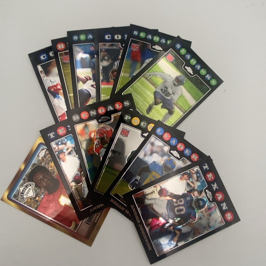 2008 Topps Chrome NFL Football Trading Cards: This is a collection of various 2008 Topps Chrome NFL football trading cards. The cards feature individual player action shots and team-branded borders. Several cards are marked with a rookie card log