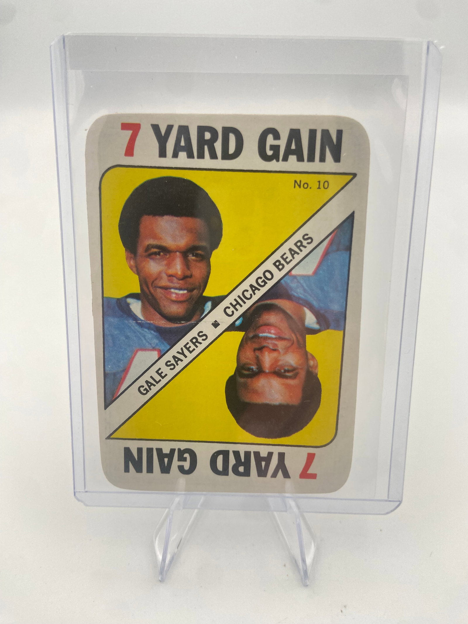 1970 Topps Gale Sayers Football Card: This is a 1970 Topps football card featuring Chicago Bears running back Gale Sayers. The card is labeled '7 Yard Gain' and is marked as card number 10 in the set.