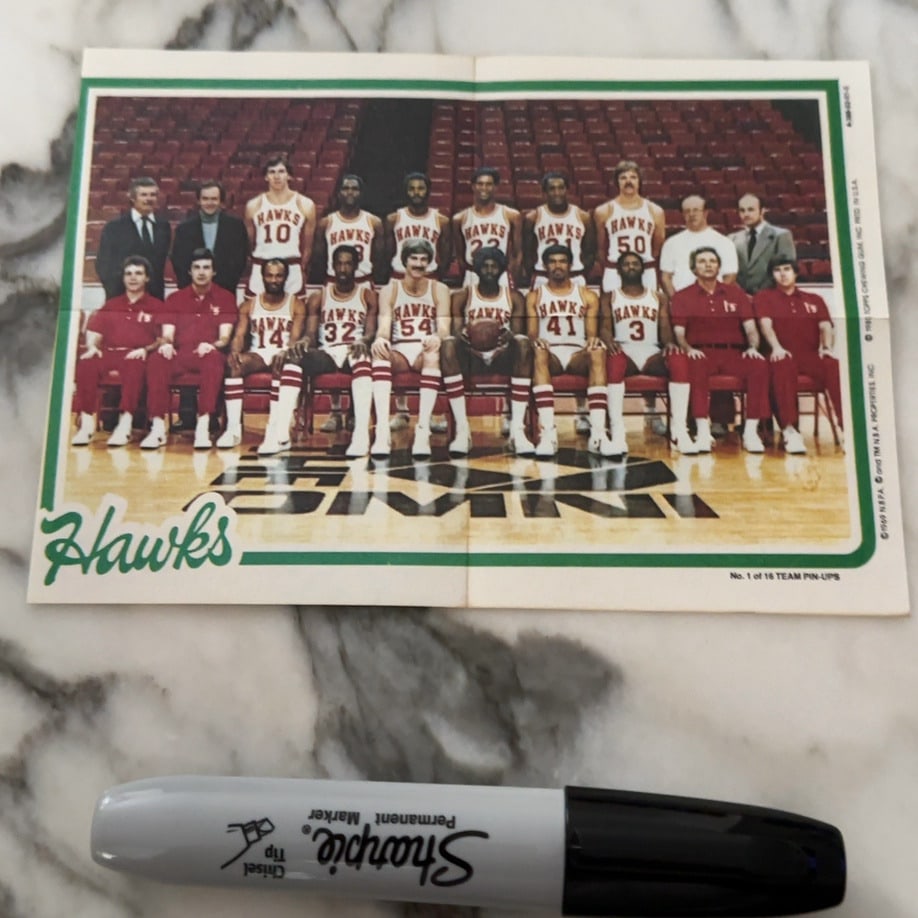 1969-70 Topps Atlanta Hawks Team Pin-Up: an original 1969-70 Topps NBA team pin-up poster featuring the Atlanta Hawks. It is marked as No. 1 of 16 in the series and displays the team roster posing on the court. The item shows a horizontal