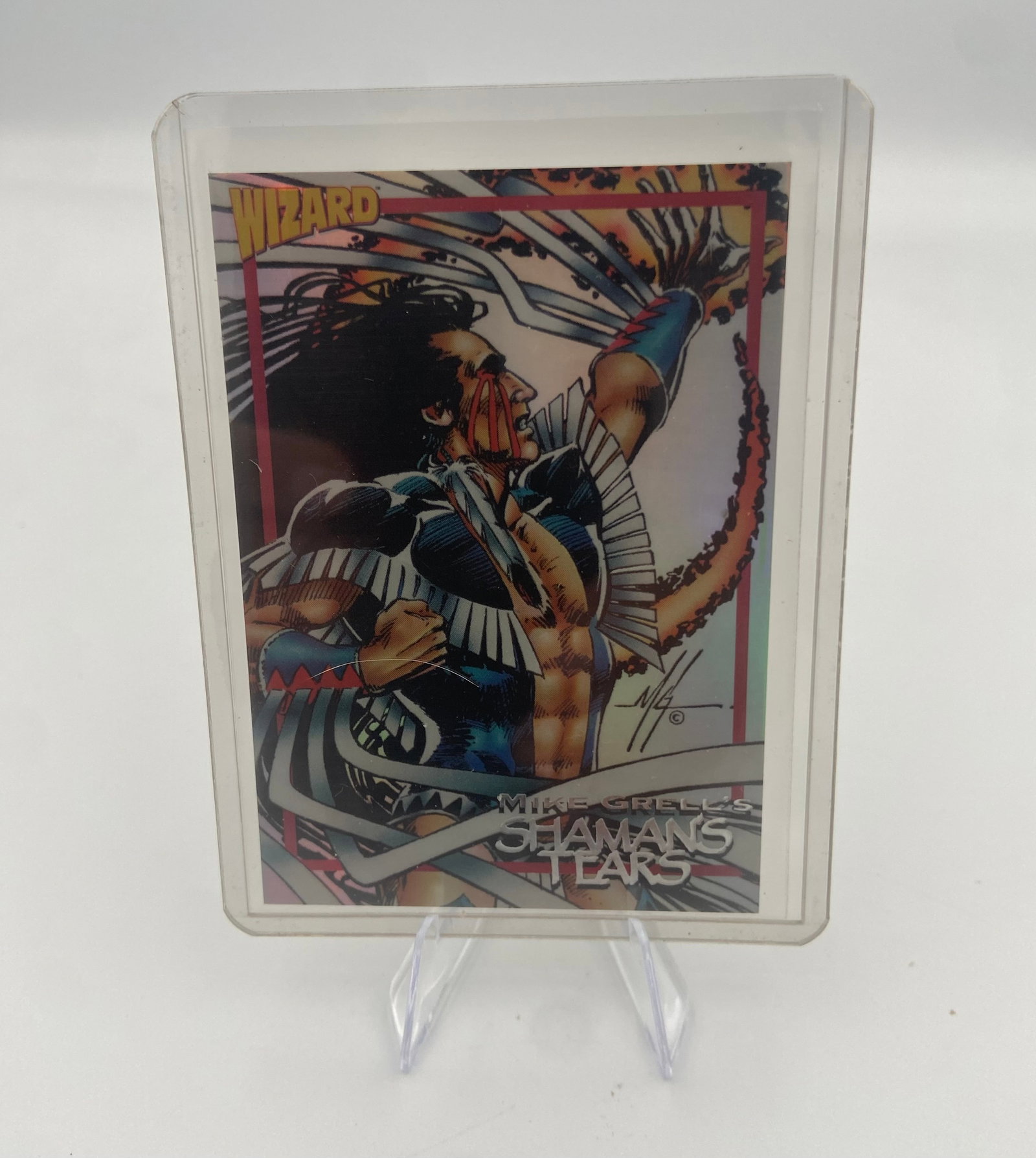 Mike Grell's Shaman's Tears Wizard Promo Card: promotional trading card for Mike Grell's comic book series, Shaman's Tears. The card was issued by Wizard magazine and features dynamic artwork representative of the 1990s comic era