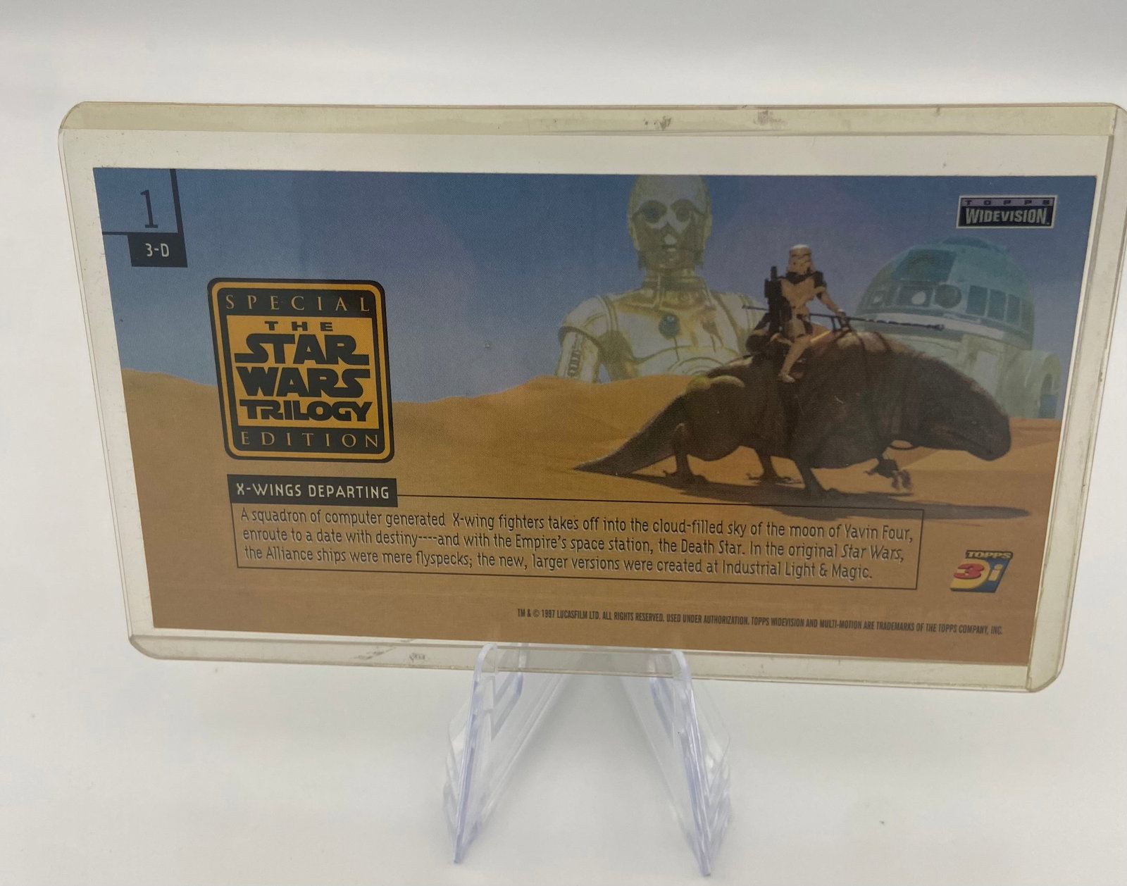 1997 Topps Star Wars Trilogy Widevision Card 1: collectible 3-D trading card from the 1997 Topps Star Wars Trilogy Special Edition Widevision set. The card features a scene with a Tusken Raider on a Bantha