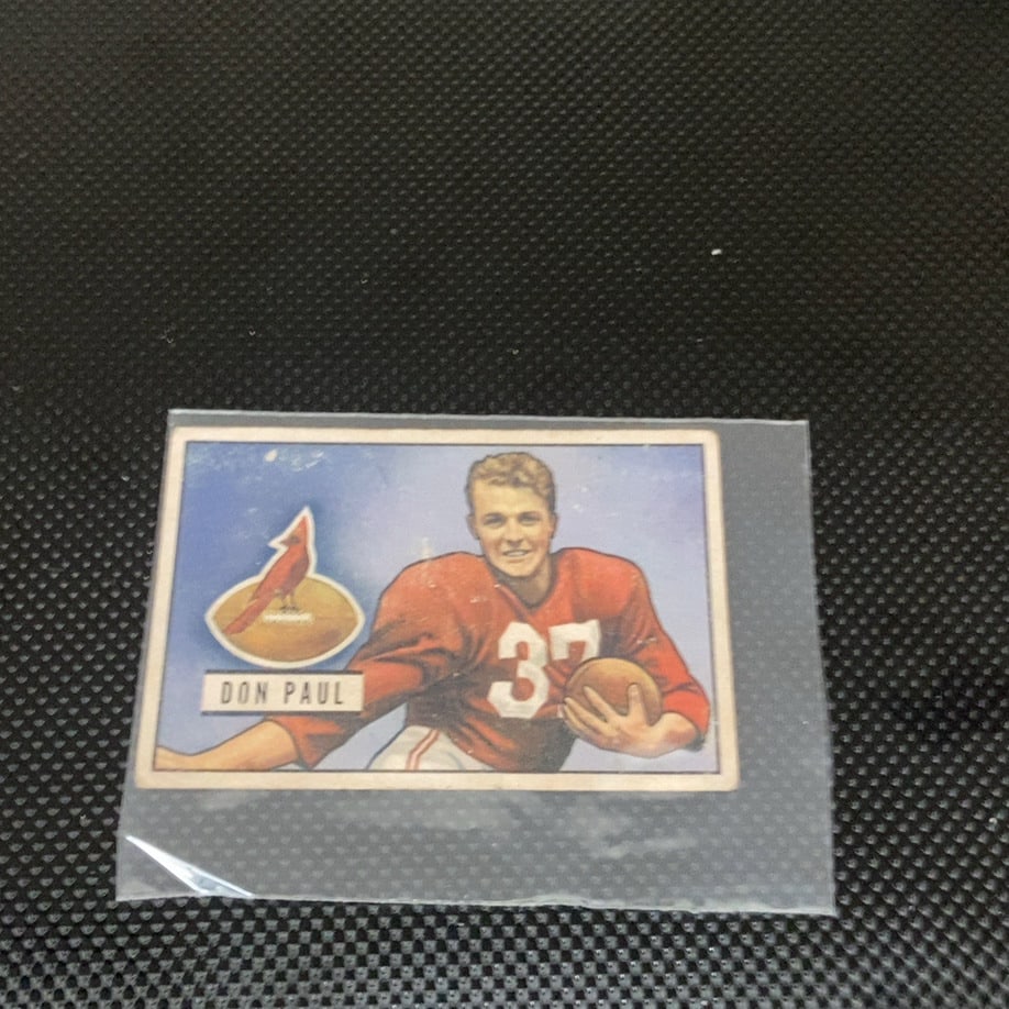1951 Bowman Football Card (#30): This is a 1952 Bowman football card featuring Don Paul of the Chicago Cardinals. The card displays a colorized illustration of Paul in his red jersey with the number 37, alongside the team's cardinal 