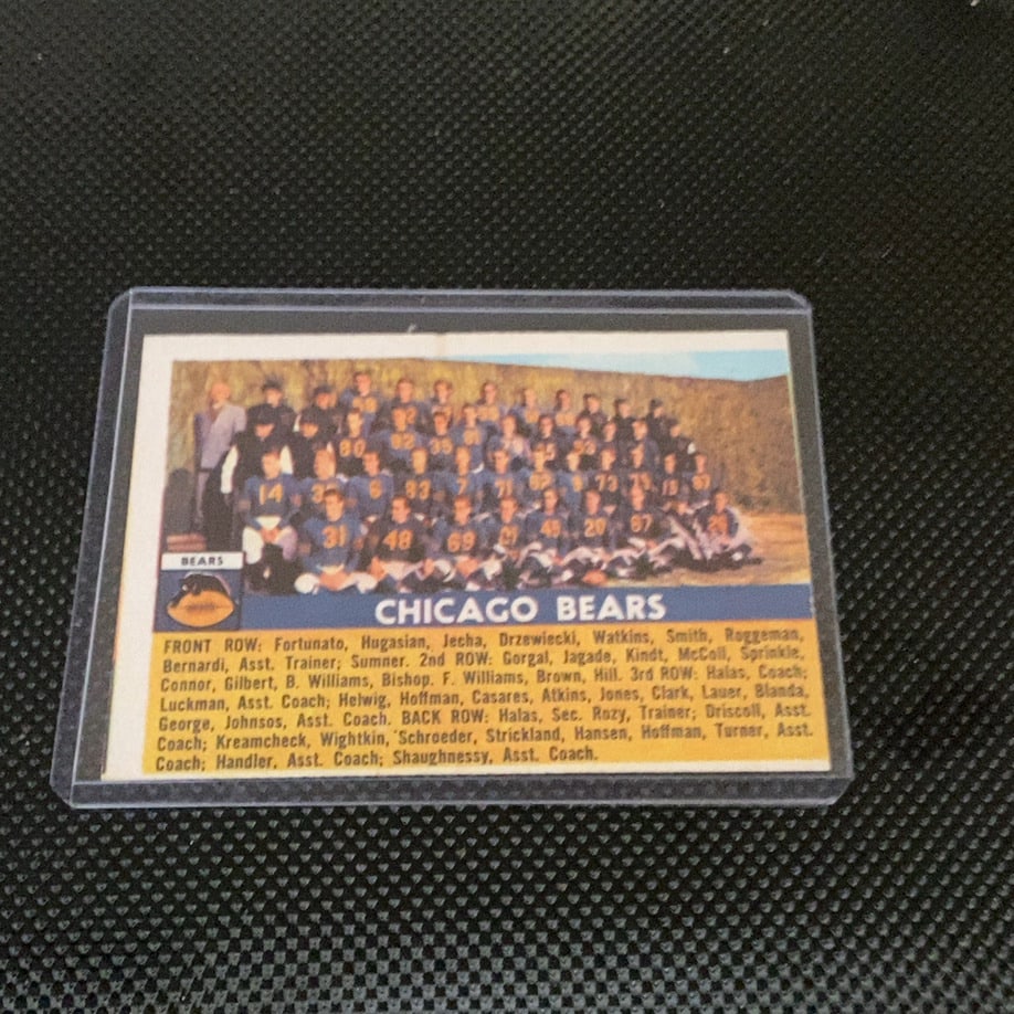 1955 Bowman Chicago Bears Team Card #129: This is a 1955 Bowman football card, specifically card #129, featuring the Chicago Bears team photo. The card is encased in a protective plastic sleeve and displays the team roster listed by rows at t