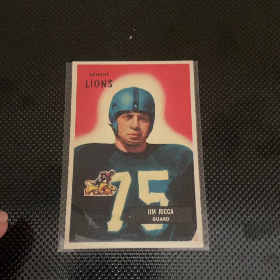 1952 Bowman Jim Ricca Detroit Lions Football Card: This is a 1952 Bowman football card featuring Jim Ricca, a guard for the Detroit Lions. The vintage trading card showcases a colorful portrait style design typical of the 1952 set and appears to be