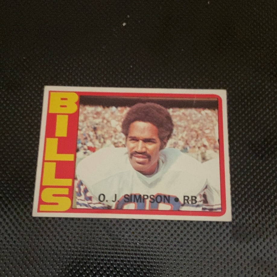1978 Topps O.J. Simpson Buffalo Bills Football Card: This is a 1978 Topps football card featuring O.J. Simpson playing for the Buffalo Bills. The card captures the running back in his team uniform and appears to be in overall good condition, showing