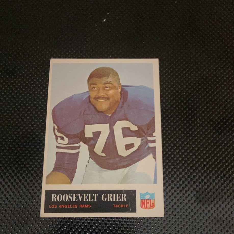1968 Topps Roosevelt Grier Football Card: This is a 1968 Topps football card featuring Roosevelt Grier of the Los Angeles Rams. The card showcases Grier in his team uniform and appears to be in overall good condition, with clean colors and