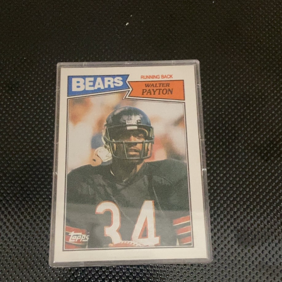 Walter Payton Topps Bears: This is a Topps trading card featuring Chicago Bears running back Walter Payton wearing his number 34 jersey. The card prominently displays his name and team affiliation.