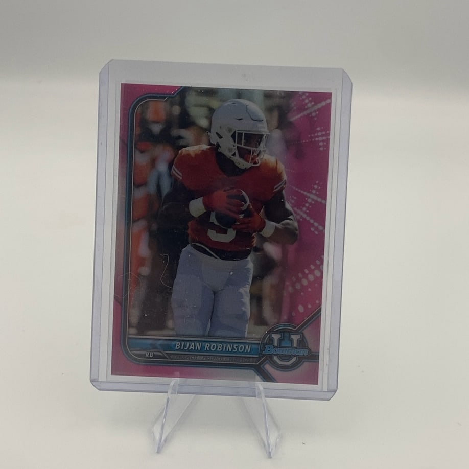 2023 Bowman U Bijan Robinson: This is a 2023 Bowman U trading card featuring running back Bijan Robinson. The card showcases him in his college uniform and features a vibrant pink parallel border design.