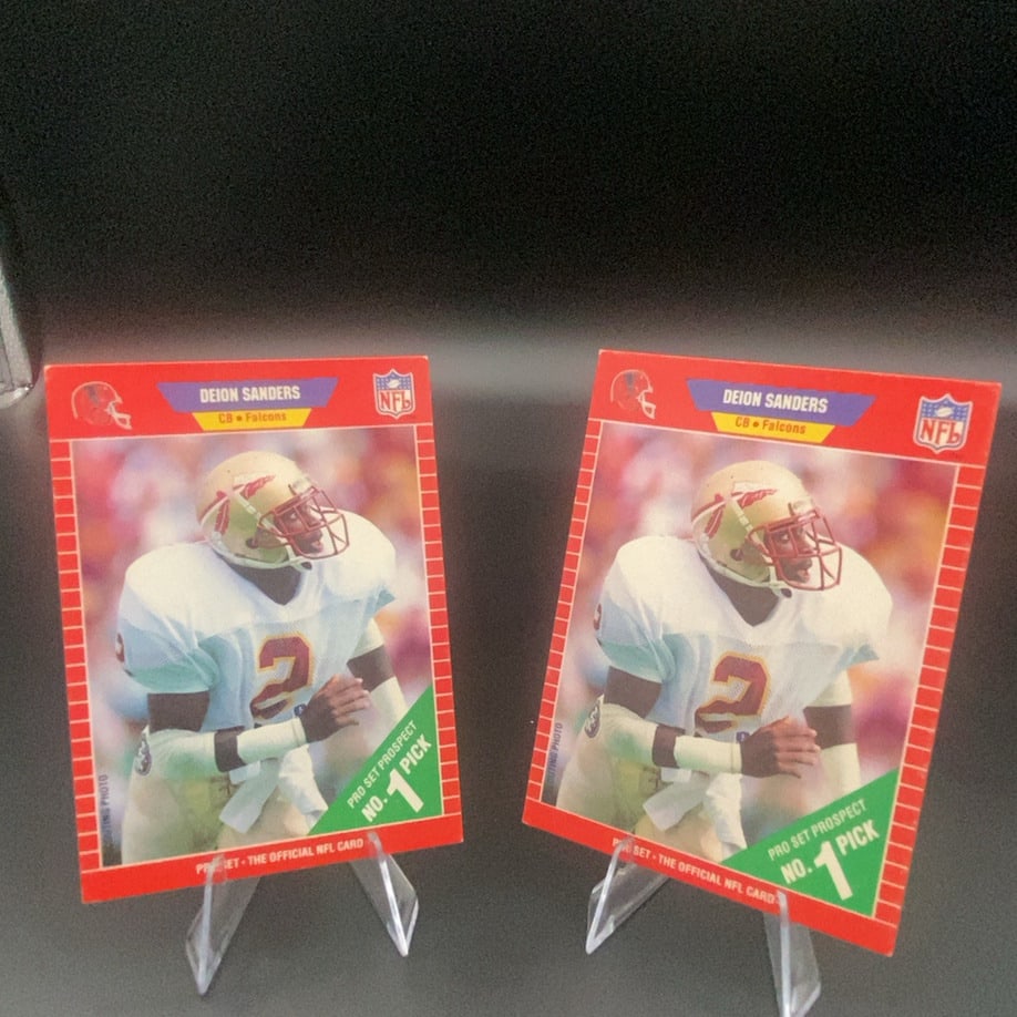 1989 Pro Set Deion Sanders: These are two 1989 Pro Set football cards featuring Deion Sanders during his time with the Atlanta Falcons. The cards are marked as a 'Pro Set Prospect' and 'No. 1 Pick'.