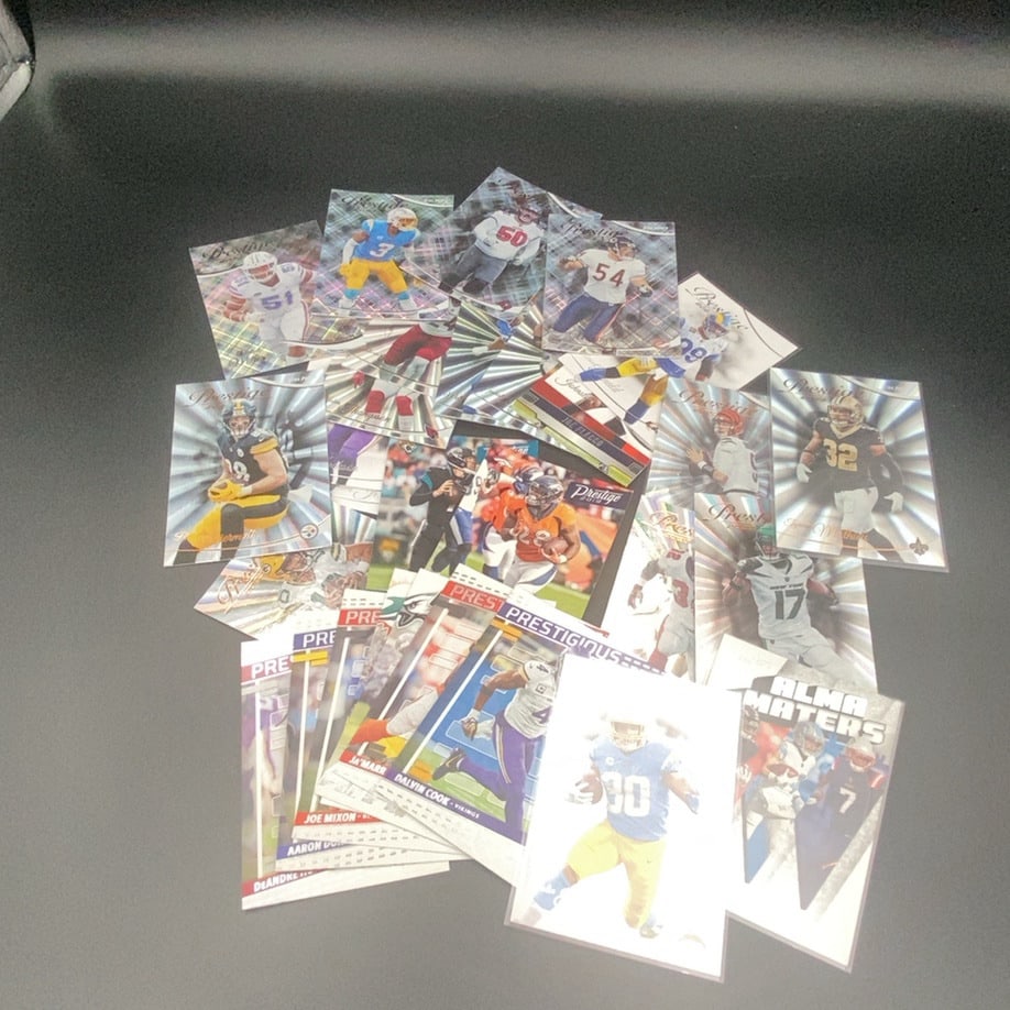 2019 Panini Prestige Football Trading Card Lot: This is a collection of various 2019 Panini Prestige football trading cards featuring multiple NFL players. The cards display the distinct radial design characteristic of the 2019 Prestige set. The