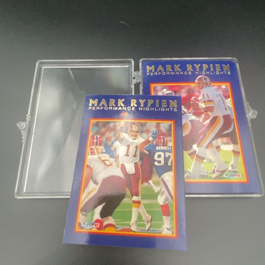 1992 Fleer Mark Rypien Performance Highlights: This is a 1992 Fleer 'Performance Highlights' football card featuring Mark Rypien of the Washington Redskins. The card is displayed in a hard plastic protective case.