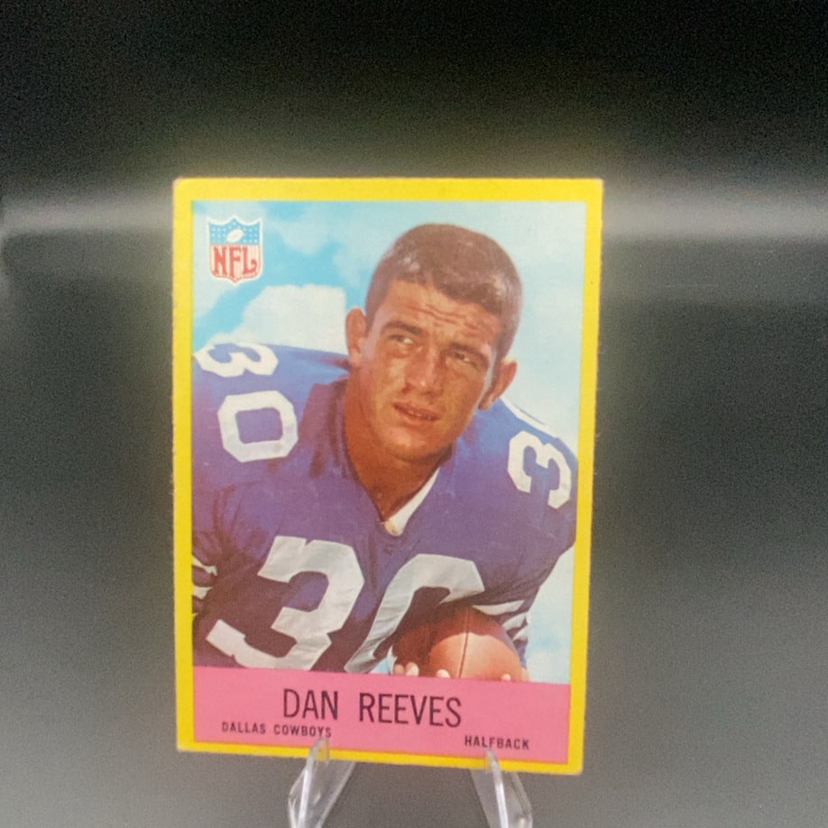 Dan Reeves Dallas Cowboys Halfback: This is a vintage football trading card featuring Dan Reeves of the Dallas Cowboys. The card identifies him as a halfback and includes the official NFL logo. The design features a colorful portrait