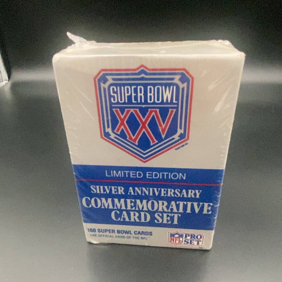1991 Pro Set Super Bowl XXV Commemorative Card Set: This is a sealed, limited edition silver anniversary commemorative card set celebrating Super Bowl XXV. Produced by Pro Set, the set contains 160 Super Bowl cards and is labeled as an official