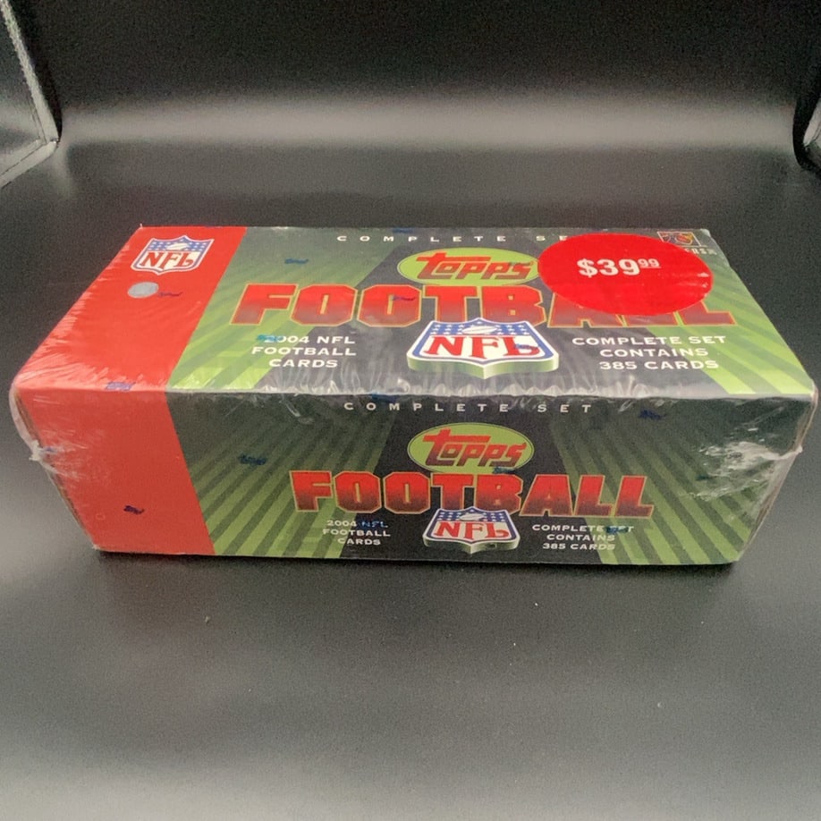 2004 Topps NFL Football Complete Set: This is a sealed 2004 Topps NFL Football complete set box. The box indicates that it contains 385 football cards.