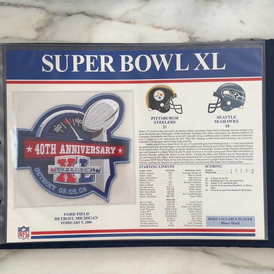 Super Bowl XL Commemorative Display: This is a commemorative display sheet featuring information about Super Bowl XL held at Ford Field in Detroit, Michigan on February 5, 2006. It includes an embroidered patch celebrating the 40th
