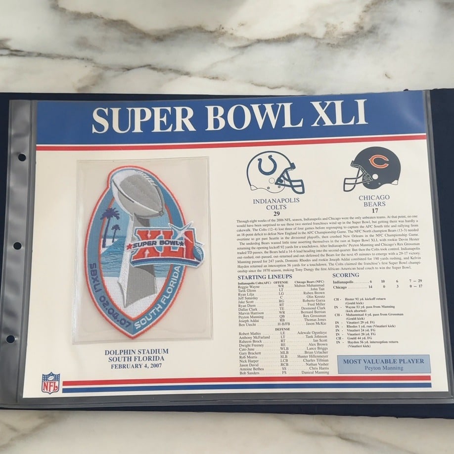 Super Bowl XLI Memorabilia Patch: This is a commemorative memorabilia page featuring an embroidered patch from Super Bowl XLI. The display includes the final score of 29-17 in favor of the Indianapolis Colts over the Chicago Bears, al