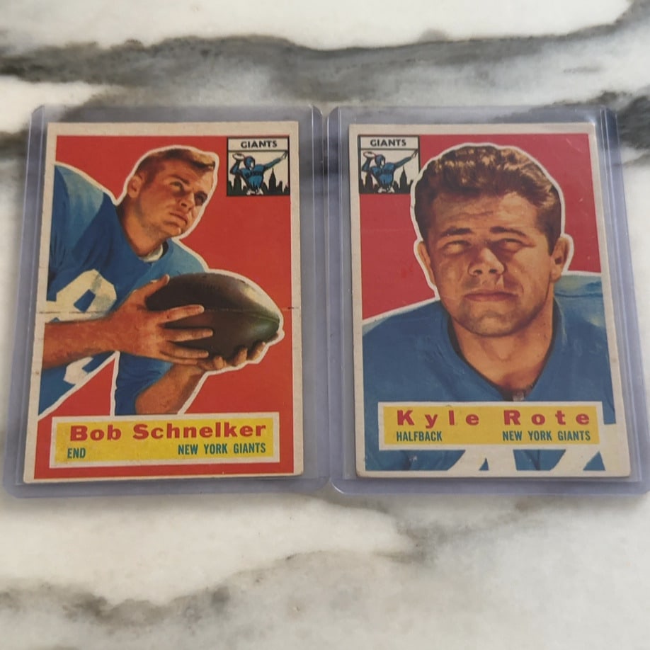 1131 -New York Giants football trading cards: 1131-This image features two vintage New York Giants football trading cards. The cards depict players Bob Schnelker, an End, and Kyle Rote, a Halfback, both identified with the New York Giants logo.