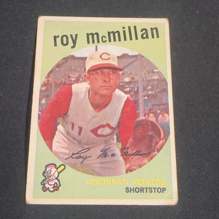 1959 Vintage Topps Roy McMillan: 1959 Vintage Topps baseball card featuring Cincinnati Redlegs shortstop Roy McMillan. The card showcases a portrait of the player in his uniform with a printed facsimile autograph.