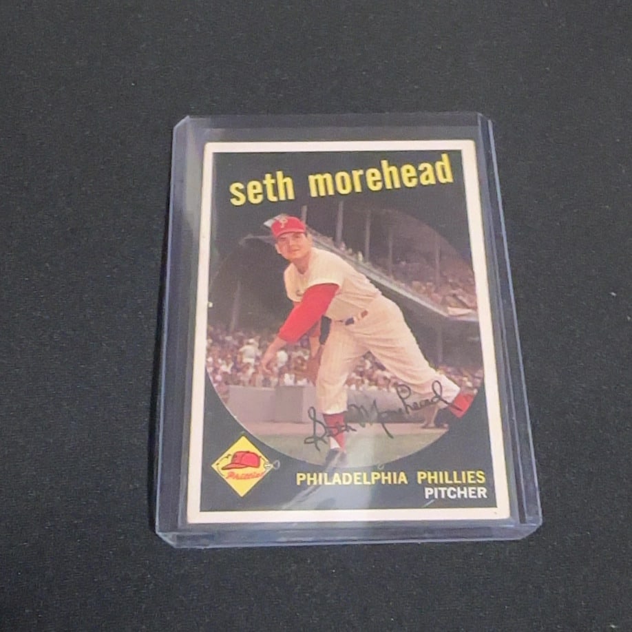 1959 Vintage Topps Seth Morehead Baseball Card: This is a 1959 Vintage Topps baseball card featuring Philadelphia Phillies pitcher Seth Morehead. The card displays a dynamic action shot of Morehead in his pitching motion, complete with his printed