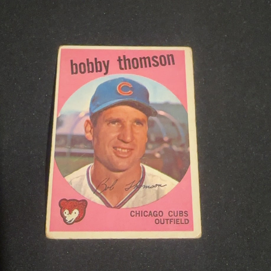Vintage Bobby Thomson Chicago Cubs Baseball Card: This is a vintage baseball trading card featuring Bobby Thomson of the Chicago Cubs. The card displays a player portrait with the team name and position printed on the front, alongside an illustrated