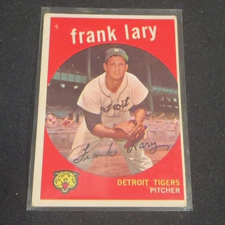 1959 Vintage Topps Frank Lary: 1959 Vintage Topps baseball card featuring Detroit Tigers pitcher Frank Lary. The card showcases a classic design with a circular portrait of the player and a facsimile signature, along with the team