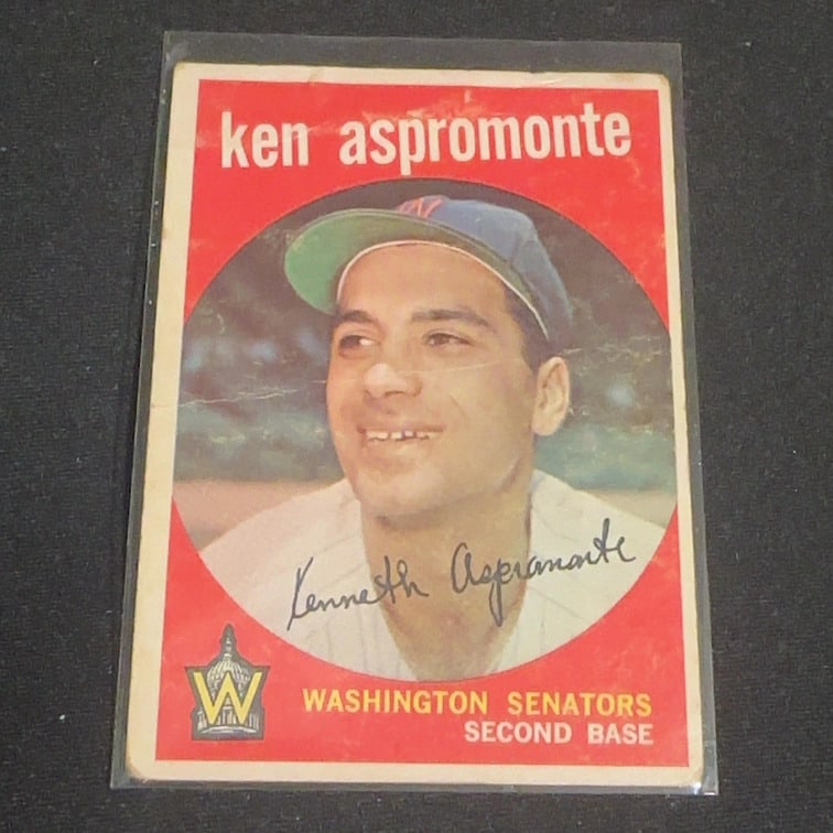Ken Aspromonte Washington Senators: This is a vintage baseball card featuring Ken Aspromonte of the Washington Senators. The card displays his name at the top with his facsimile signature on the image and identifies his position as