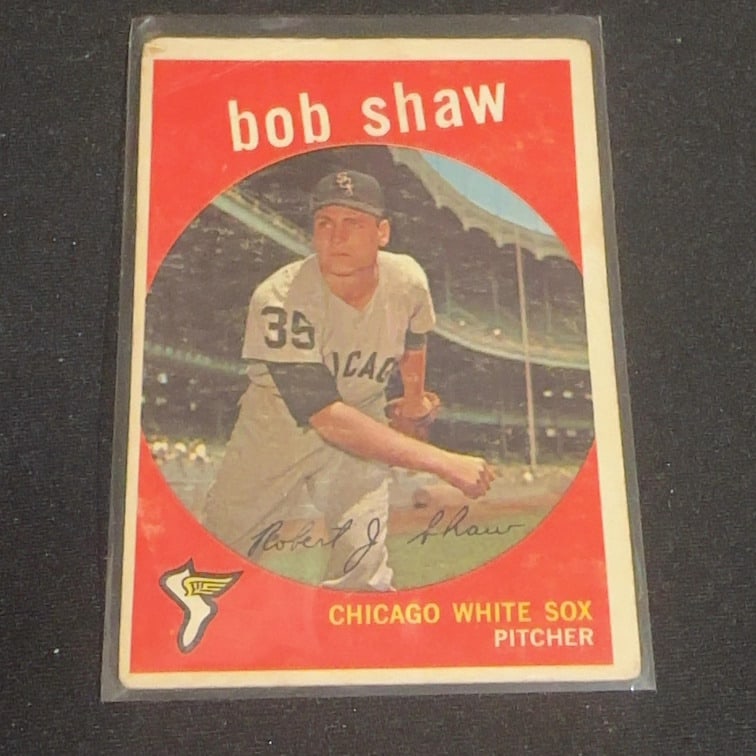 Bob Shaw Chicago White Sox Pitcher: This is a vintage trading card featuring pitcher Bob Shaw of the Chicago White Sox. The card displays a portrait of the player in his uniform and includes a signature facsimile across the image.