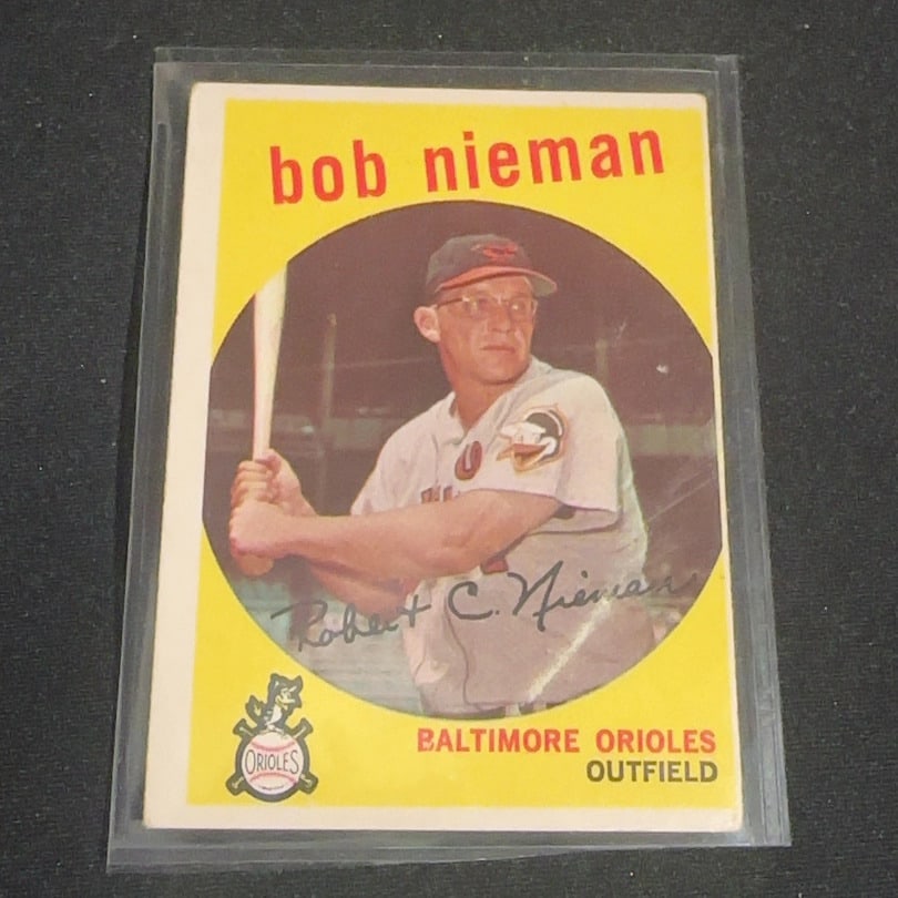 1959 Vintage Topps Bob Nieman: 1959 Vintage Topps trading card featuring Baltimore Orioles outfielder Bob Nieman. The card displays a portrait of the player alongside his printed signature and the Orioles team logo. It is a classic