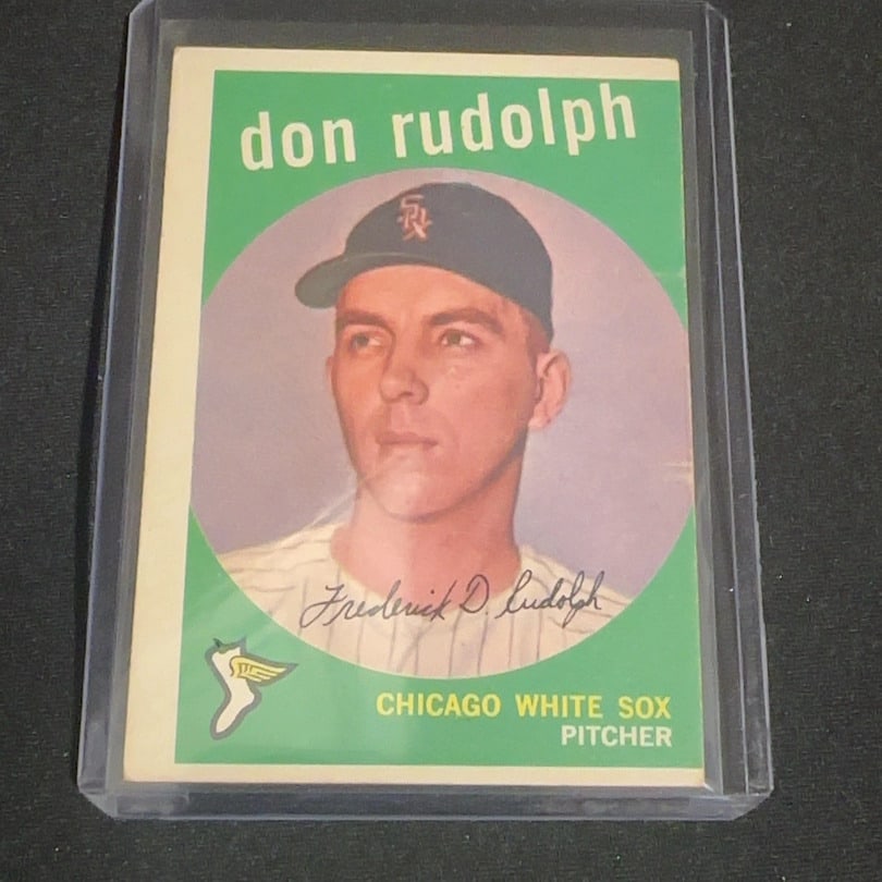 Vintage Don Rudolph Chicago White Sox Baseball Card: This is a vintage baseball card featuring Don Rudolph of the Chicago White Sox. The card identifies him as a pitcher for the team and includes a facsimile signature across the image.
