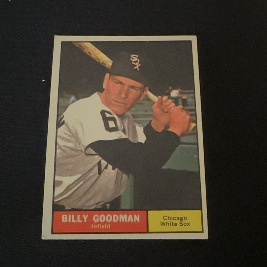 1961 Topps Billy Goodman: 1961 Topps baseball card featuring Billy Goodman of the Chicago White Sox. The front of the card displays his name, position, and team name with a portrait of him holding a bat.