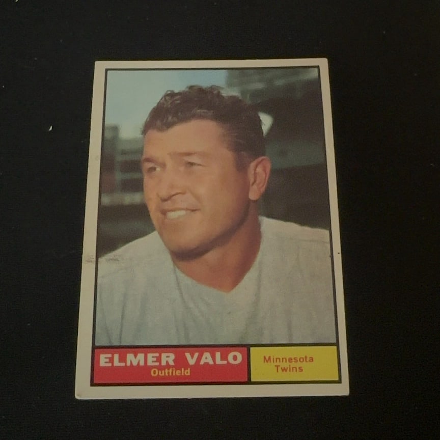 Elmer Valo Minnesota Twins: This is a vintage baseball card featuring Elmer Valo of the Minnesota Twins. The card displays his name and position as Outfield at the bottom. It is a classic sports collectible.