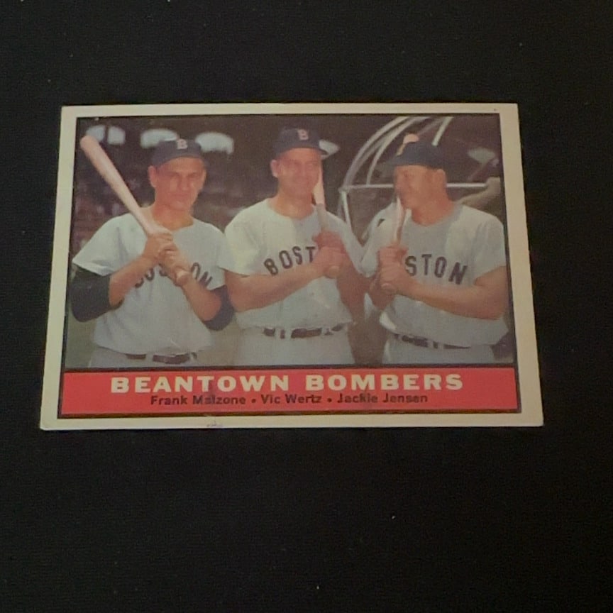 Beantown Bombers Frank Malzone Vic Wertz Jackie Jensen: This is a vintage baseball card titled Beantown Bombers. It features three Boston players: Frank Malzone, Vic Wertz, and Jackie Jensen holding bats.