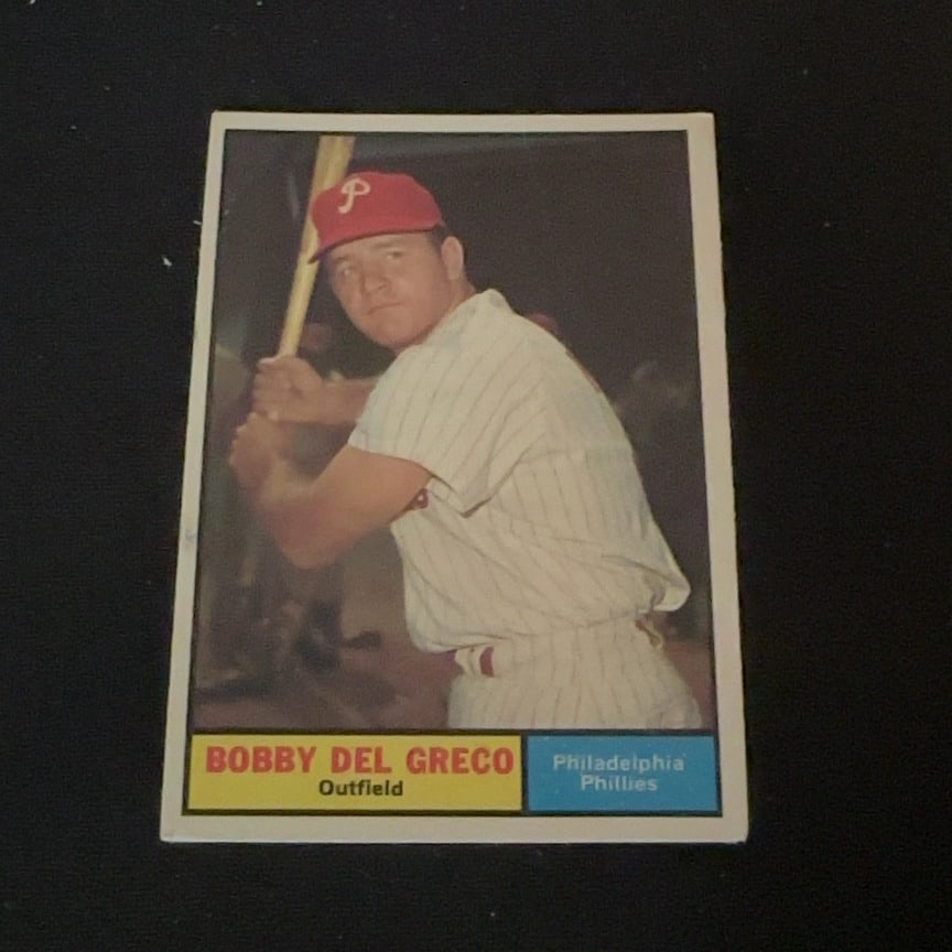 Bobby Del Greco Philadelphia Phillies: This is a baseball card featuring Bobby Del Greco of the Philadelphia Phillies. He is depicted in his team uniform holding a bat.