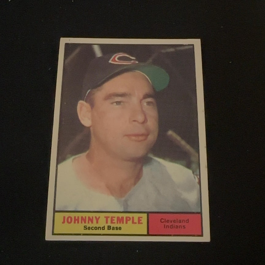 Johnny Temple Cleveland Indians: This is a vintage baseball card featuring Johnny Temple, who played second base for the Cleveland Indians. The card captures a portrait shot of the player with his team name and position clearly