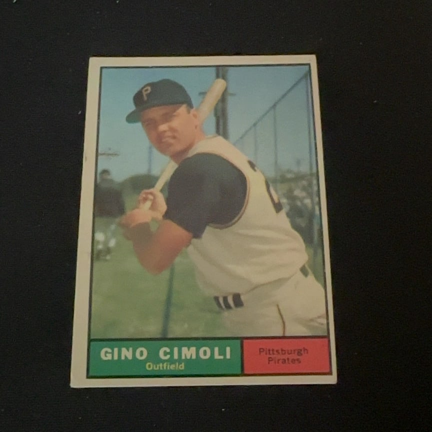 Gino Cimoli Pittsburgh Pirates: This is a vintage baseball card featuring Gino Cimoli of the Pittsburgh Pirates. The card shows Cimoli in his team uniform holding a baseball bat.