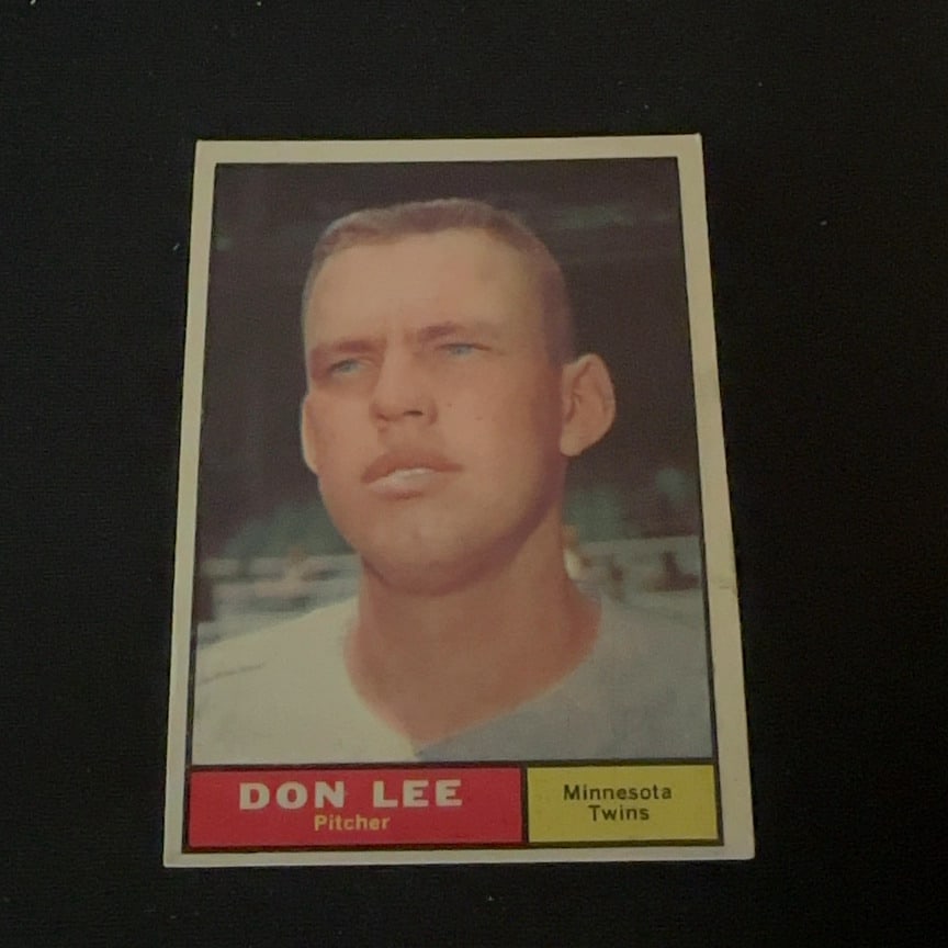 Don Lee Minnesota Twins: This is a vintage sports card featuring Don Lee, a pitcher for the Minnesota Twins. The card displays a portrait of the player and identifies his team and position at the bottom.