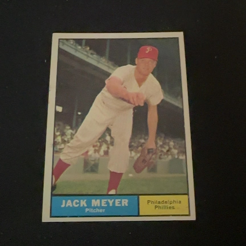 Jack Meyer Philadelphia Phillies: This is a vintage baseball card featuring Jack Meyer, a pitcher for the Philadelphia Phillies. The card shows Meyer in a pitching action pose on the field. It is a classic collectible sports card