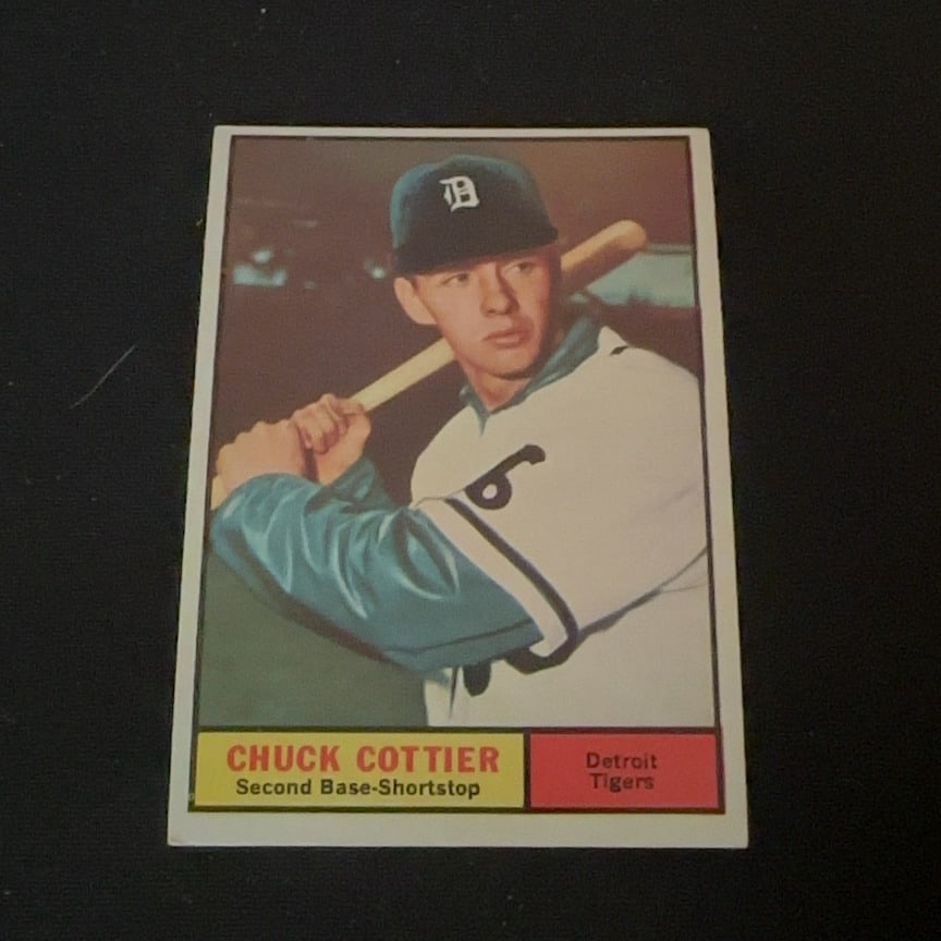 Chuck Cottier Detroit Tigers: This is a vintage baseball card featuring Chuck Cottier of the Detroit Tigers. The player is shown wearing his Tigers cap with a bat over his shoulder.