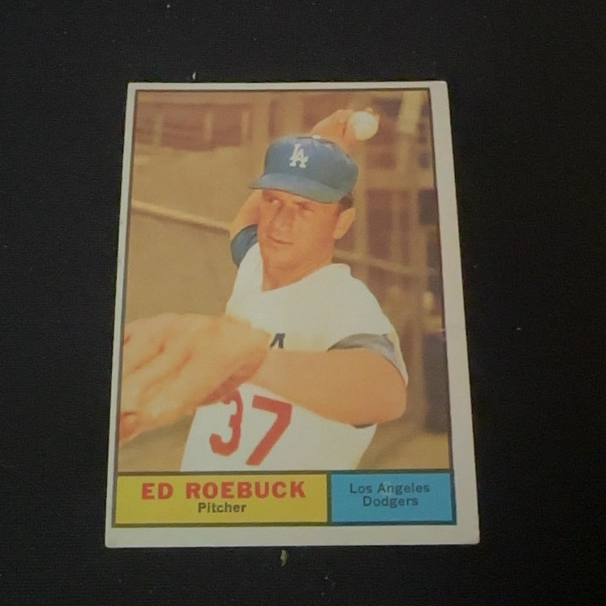 Ed Roebuck Los Angeles Dodgers: This is a vintage trading card featuring Ed Roebuck, a pitcher for the Los Angeles Dodgers. The card depicts him in his pitching uniform and includes his name and team printed at the bottom.