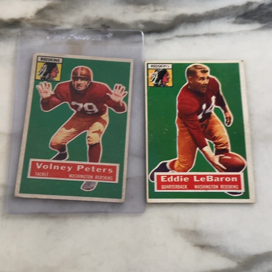 1955 Bowman Washington Redskins Football Cards: This image features two vintage 1955 Bowman football cards representing the Washington Redskins. The cards depict players Volney Peters and Eddie LeBaron with their respective positions printed at