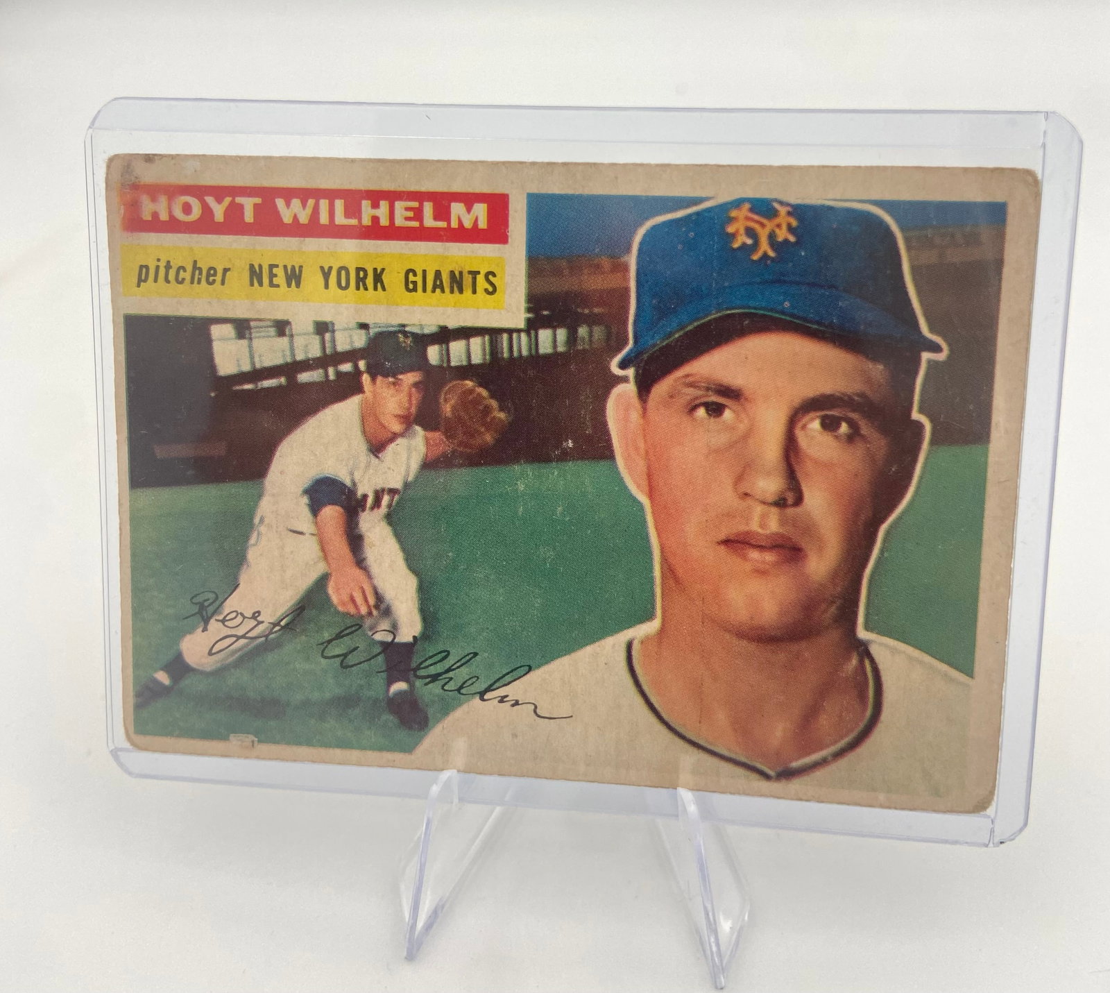 Vintage Hoyt Wilhelm New York Giants Baseball Card: This is a vintage baseball card featuring Hall of Fame pitcher Hoyt Wilhelm. The card prominently displays his name, position, and the New York Giants team affiliation. It features a portrait