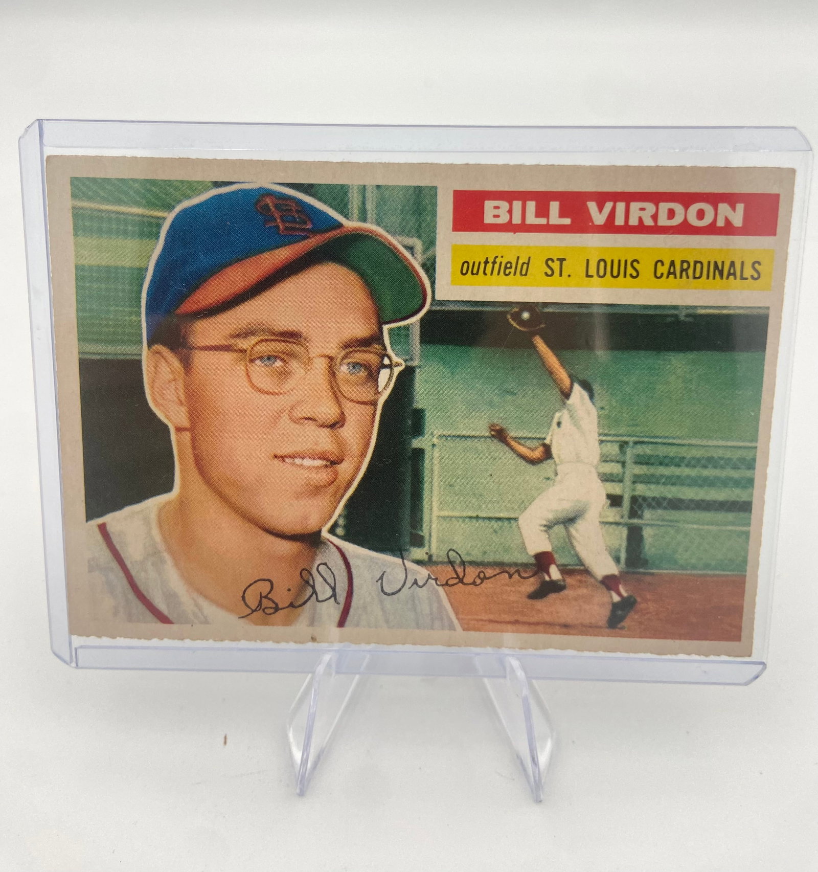 1958 Topps Bill Virdon: This is a 1958 Topps baseball card featuring St. Louis Cardinals outfielder Bill Virdon. The front includes a portrait of Virdon along with an action shot of him playing in the field, and it also feat