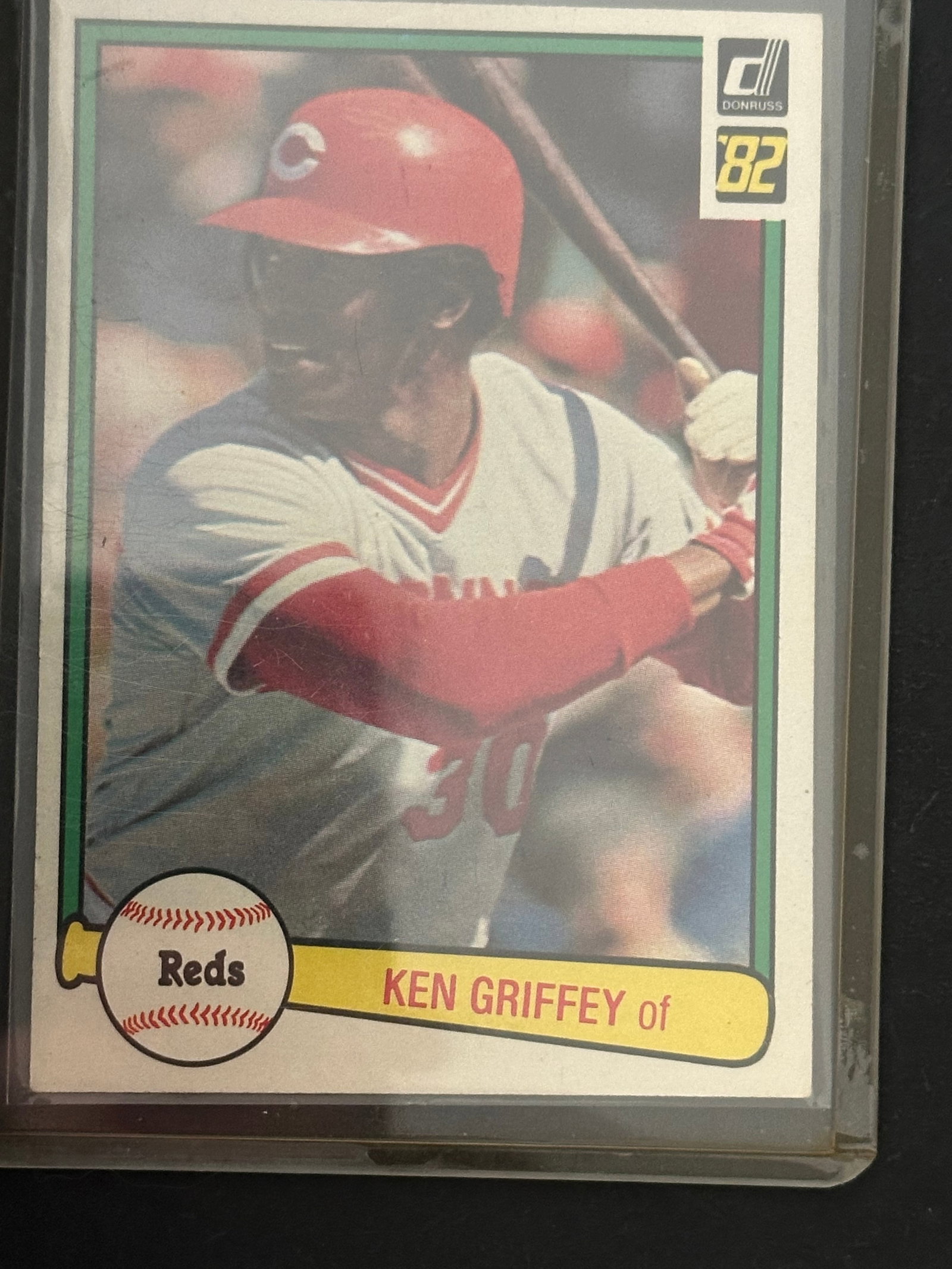 1982 Donruss Ken Griffey: This is a 1982 Donruss baseball card featuring Ken Griffey playing for the Cincinnati Reds. The card design highlights the team and player name on a yellow graphic bar on the right side. It is a