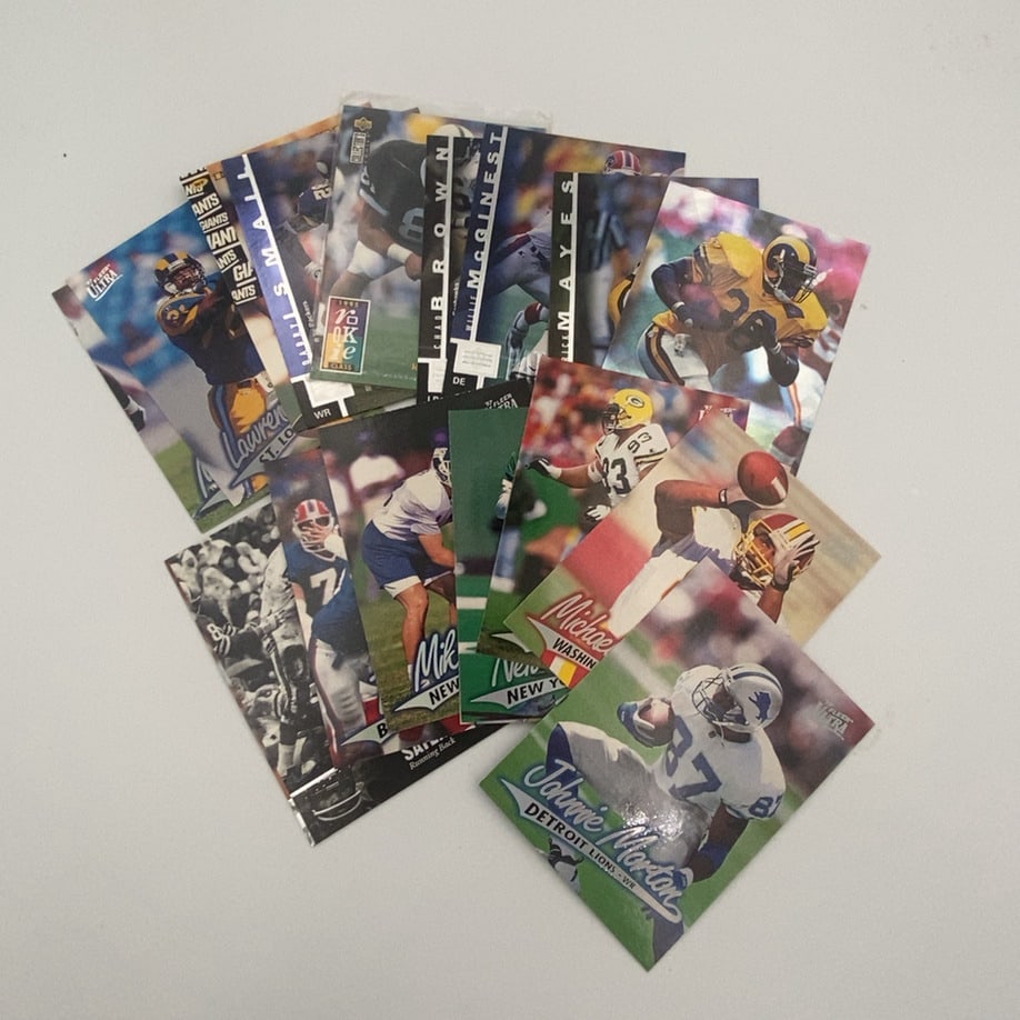 1995 Fleer Ultra Football Card Lot: This is a collection of various 1995 Fleer Ultra football trading cards. The cards feature professional football players in action, including Johnnie Morton, Michael Washington, and others. The lot