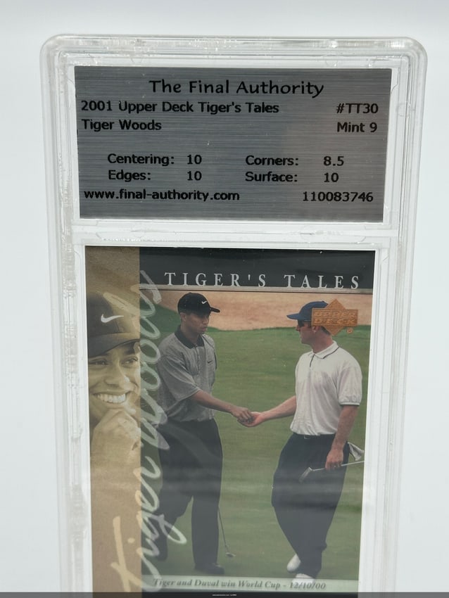 Tiger Woods & David Duval World Cup Card: 2001 upper deck tiger's tales trading card featuring tiger woods, graded mint 9. The card is identified as #tt30 and showcases a memorable moment with tiger woods and another player. It shows