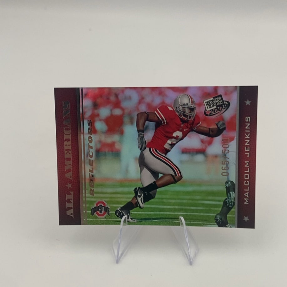 2009 Press Pass Malcolm Jenkins: This is a 2009 Press Pass football trading card featuring Malcolm Jenkins in his Ohio State uniform. The card is labeled as an 'All Americans' Reflector insert and is numbered 065/500.