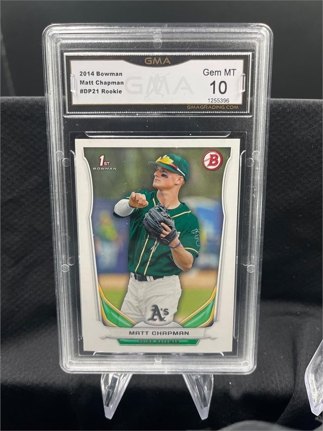 2014 Bowman Matt Chapman: This is a 2014 Bowman baseball card featuring Matt Chapman of the Oakland Athletics. The card is professionally graded by GMA as a Gem MT 10. It is marked with the 1st Bowman logo.