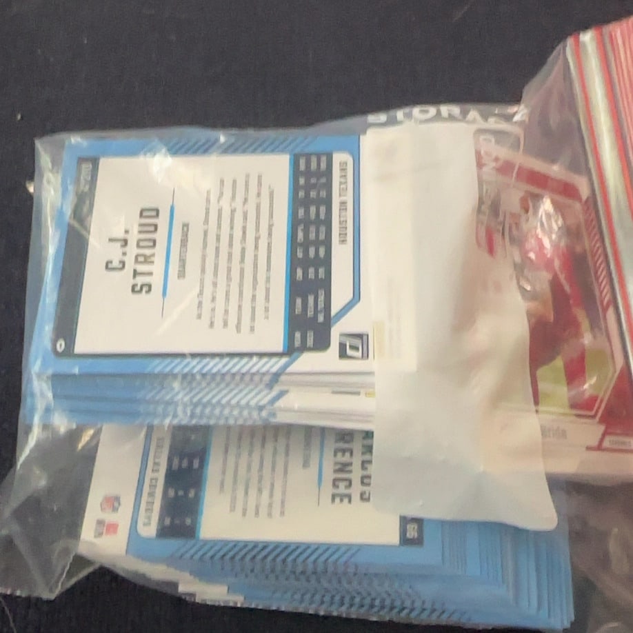 Bag Full of 2024 Panini Donruss football trading cards. - 2